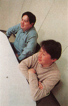 nd Hiroshi Kataoka at a table