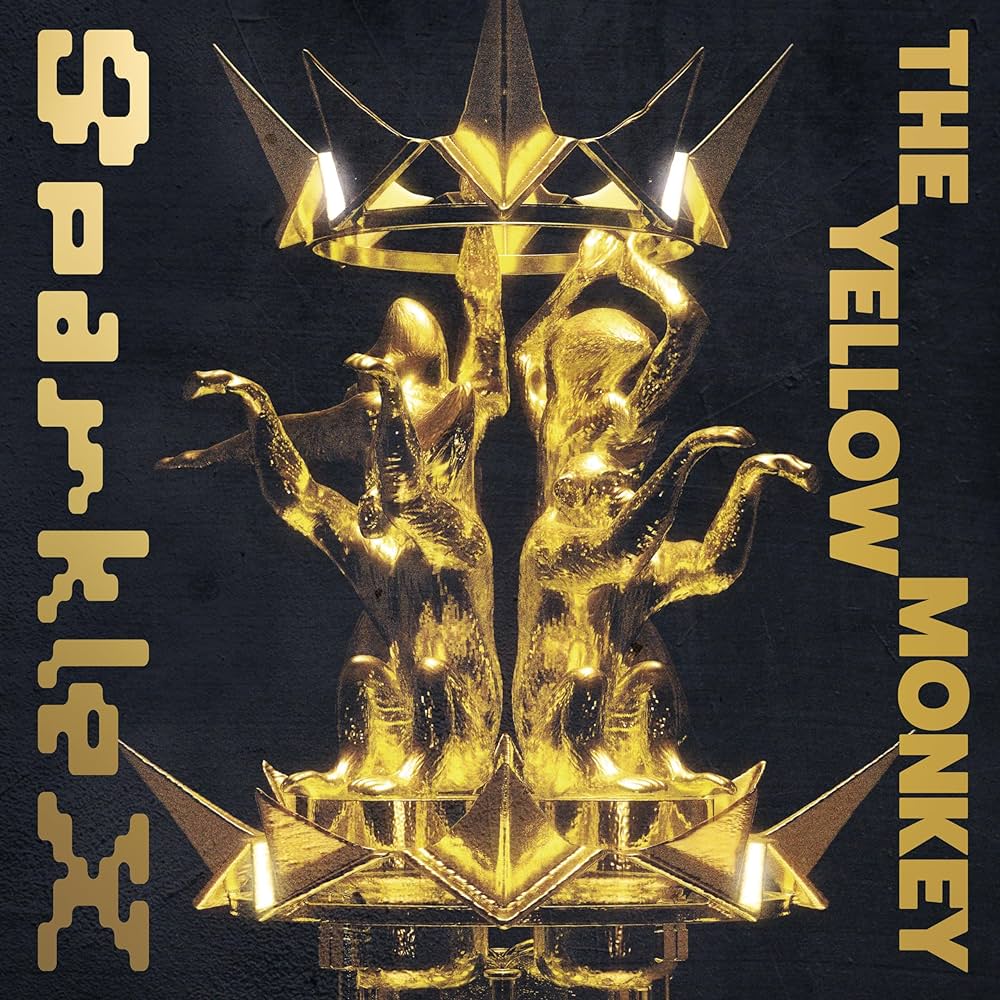 The album cover to The Yellow Monkey's 2024 album Sparkle X, depicting a gold statue of four monkies, shining brightly and holding up a brown